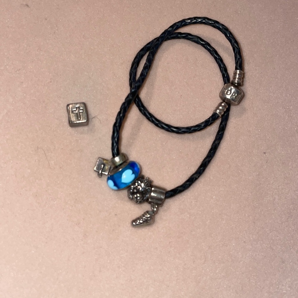 Double wrap pandora rope bracelet with five charms included in price.